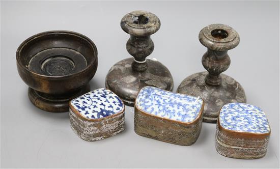 A pair of candlesticks, a turned wood cup and three plated Eastern boxes with ceramic tops